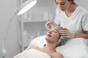 beautician-doing-filler-injection-female-client